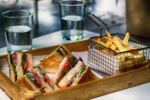 Club sandwich with fries
