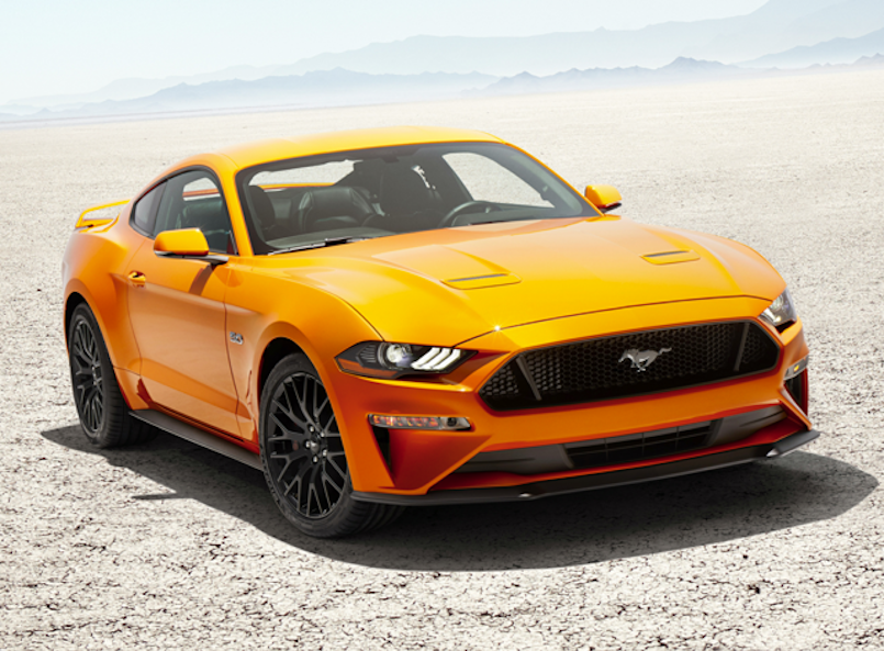 The 2023 Ford Mustang driving in a desert