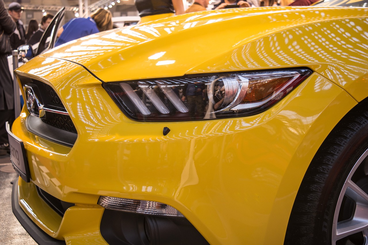 A close-up of a Mustang at an auto show