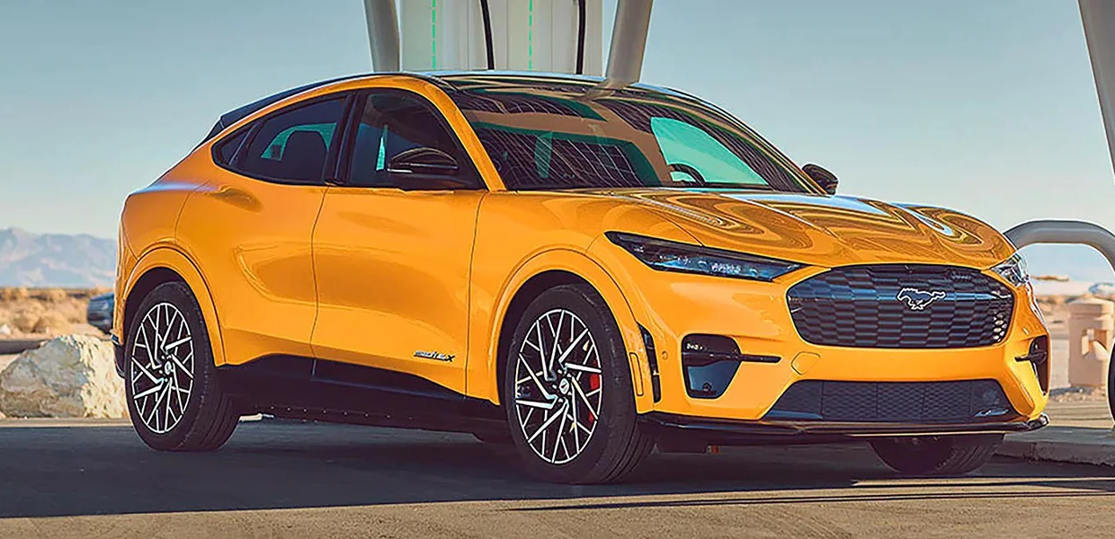 A Ford Mustang Mach E at a charging station.