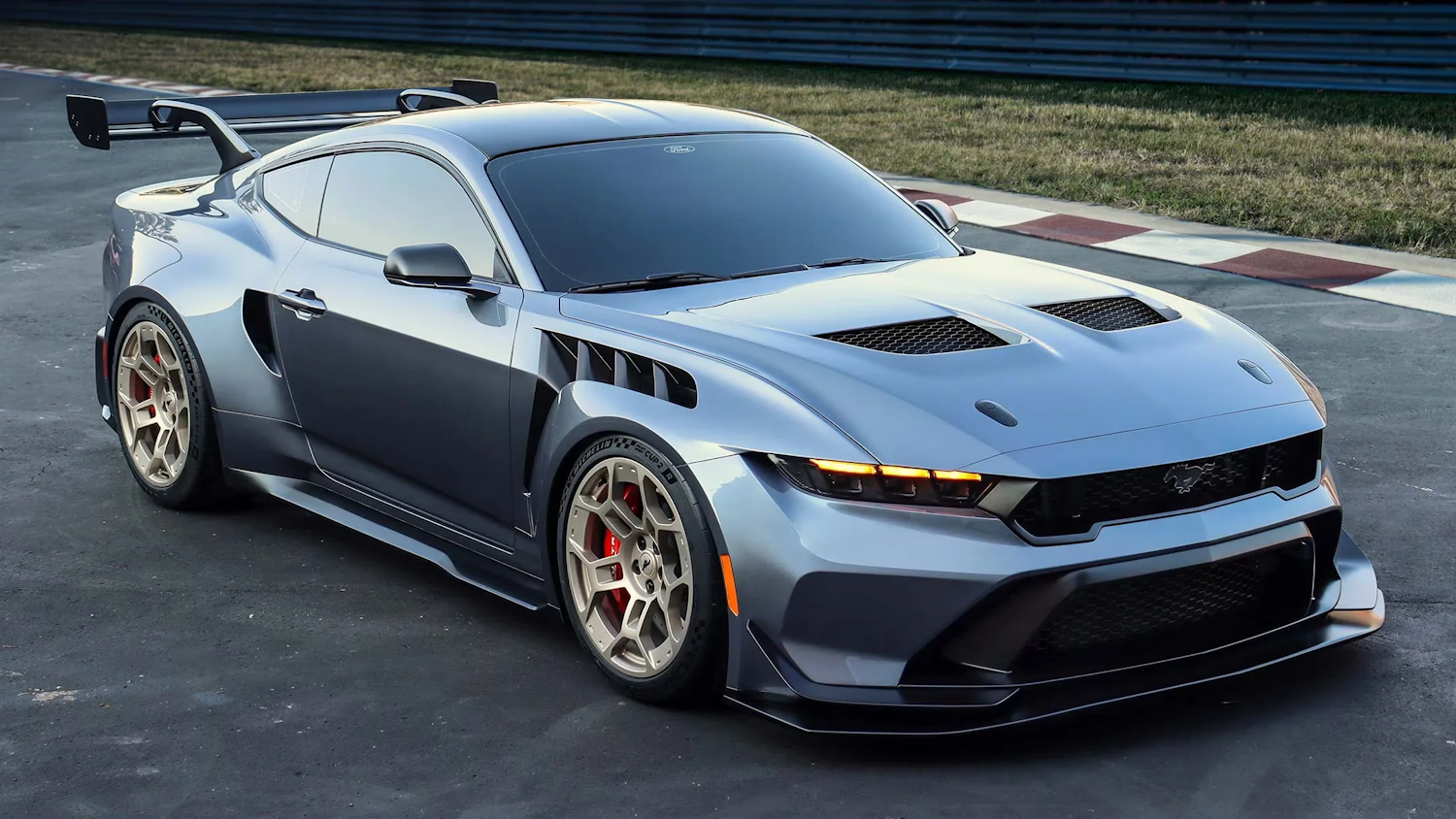 A 2025 Ford Mustang revealed on a track