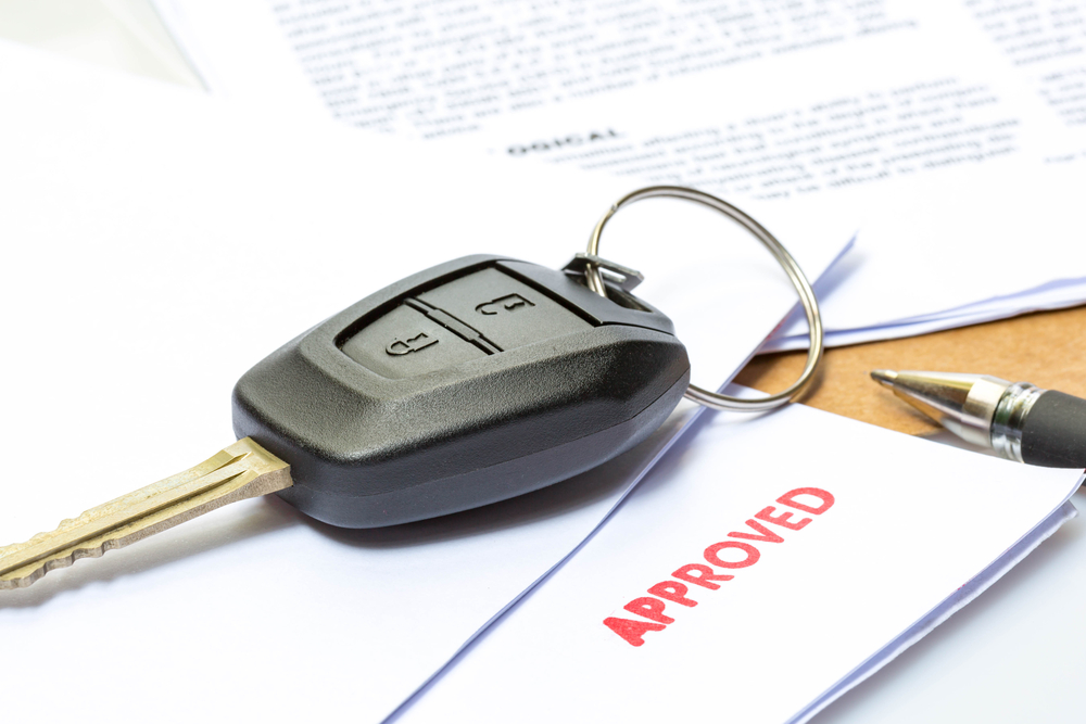 A set of keys on top of financing paperwork